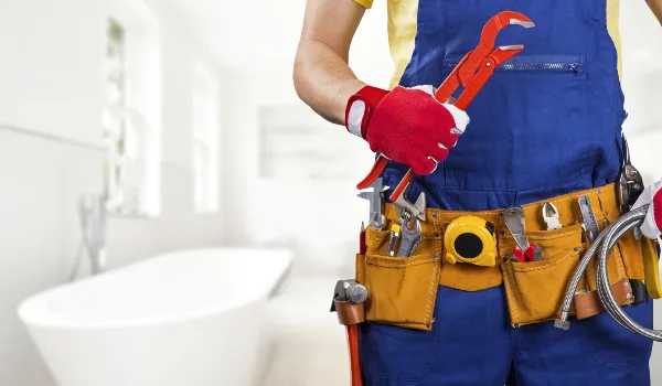 the torso of a plumbing technician showing a tool belt from Emergency Plumber San Marcos in San Marcos, TX - Commercial plumbing services the torso of a plumbing technician showing a tool belt from Emergency Plumber San Marcos in San Marcos, TX - Commercial plumbing services